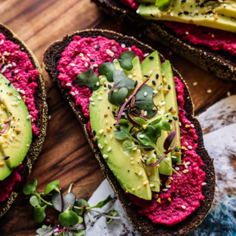 Avo Toast with Beet Hummus - Chakra Lounge