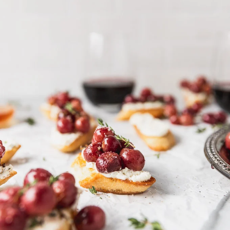 Roasted Grape and Honey Goat Cheese Crostini